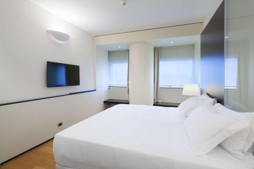 Imagen de la habitación del Hotel Nh Venezia Laguna Palace. Foto 12