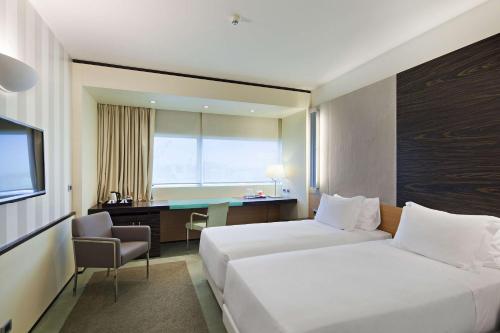 Imagen de la habitación del Hotel Nh Venezia Laguna Palace. Foto 13