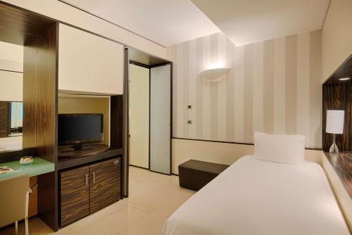 Imagen de la habitación del Hotel Nh Venezia Laguna Palace. Foto 15