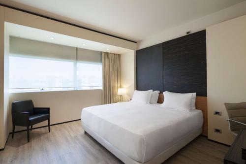 Imagen de la habitación del Hotel Nh Venezia Laguna Palace. Foto 18