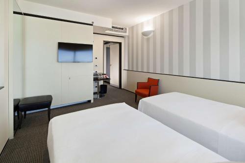 Imagen de la habitación del Hotel Nh Venezia Laguna Palace. Foto 20