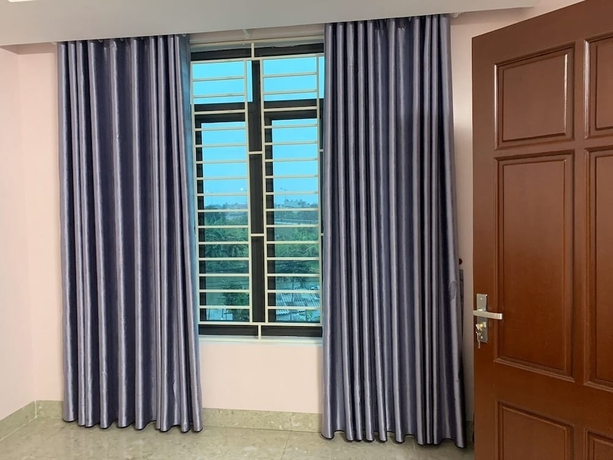 Imagen de la habitación del Hotel Nha Nghi Tung Long. Foto 6