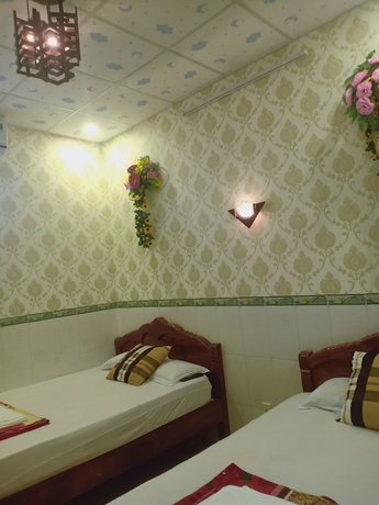 Imagen de la habitación del Hotel Nha Nghi Viet Sang. Foto 12