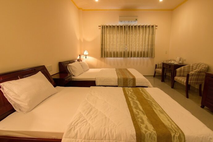 Imagen de la habitación del Hotel Nhat Ha. Foto 17