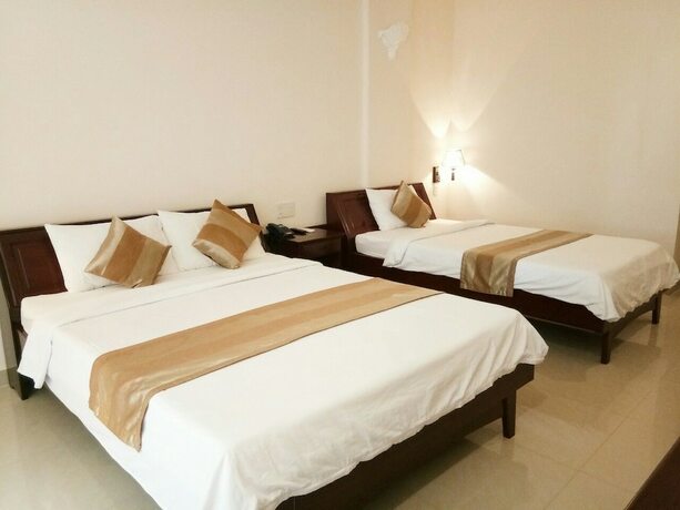 Imagen de la habitación del Hotel Nhat Ha. Foto 21