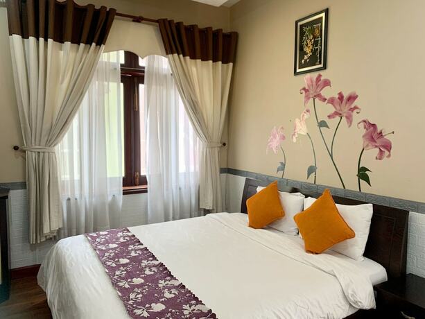 Imagen de la habitación del Hotel Nhat Huy. Foto 9