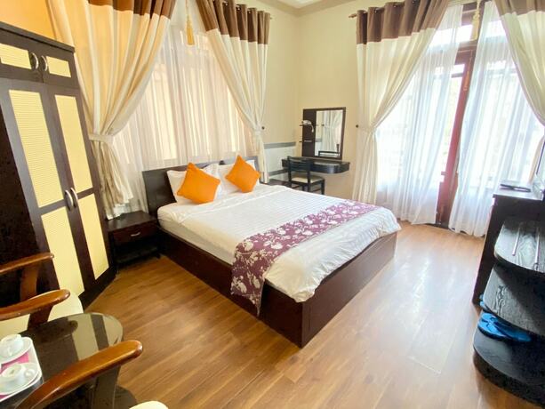 Imagen de la habitación del Hotel Nhat Huy. Foto 12