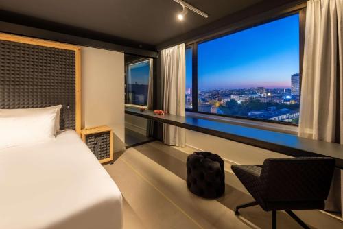 Imagen de la habitación del Hotel Nhow Brussels Bloom.. Foto 15