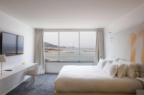 Imagen de la habitación del Hotel Nhow Marseille. Foto 20