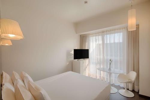 Imagen de la habitación del Hotel Nhow Milano. Foto 18