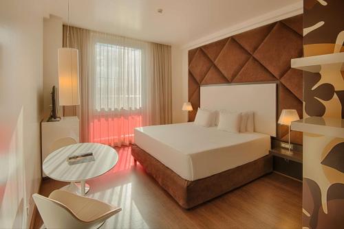 Imagen de la habitación del Hotel Nhow Milano. Foto 19