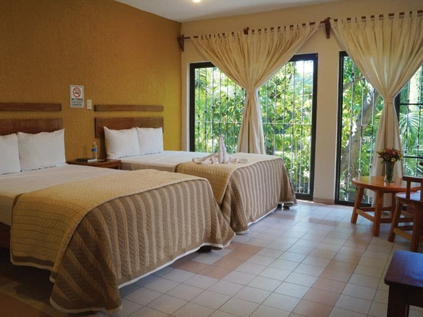 Imagen de la habitación del Hotel Nicalococ. Foto 10