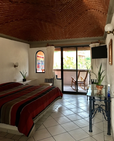 Imagen de la habitación del Hotel Nican Mo Calli. Foto 2