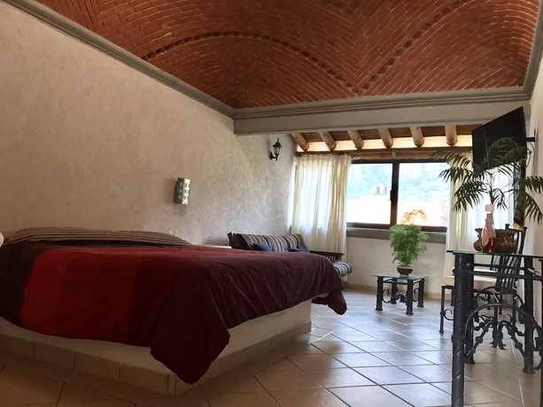 Imagen de la habitación del Hotel Nican Mo Calli. Foto 3