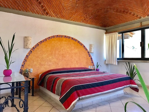 Imagen de la habitación del Hotel Nican Mo Calli. Foto 5