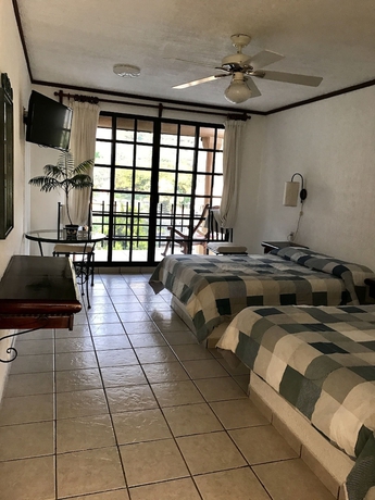 Imagen de la habitación del Hotel Nican Mo Calli. Foto 6