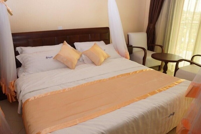 Imagen de la habitación del Hotel Nican Resort. Foto 6