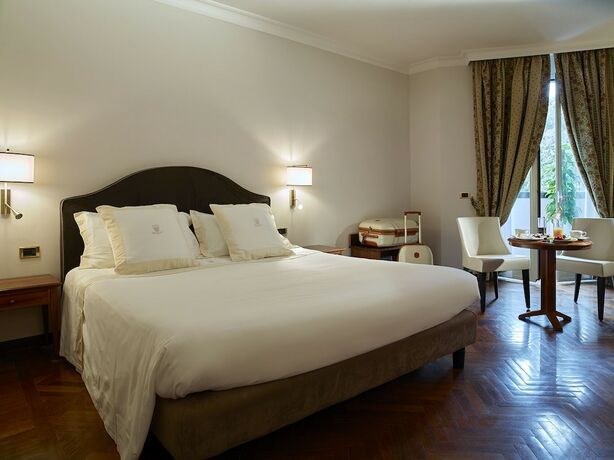 Imagen de la habitación del Hotel Niccolò V 4S - Terme dei Papi. Foto 11