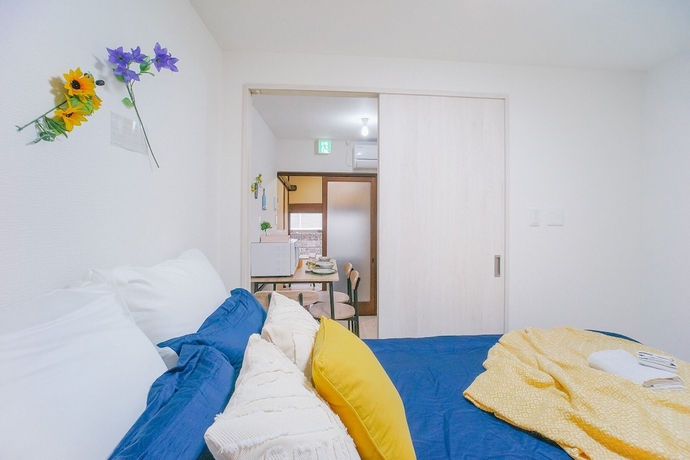 Imagen de la habitación del Hotel Nice House, Osaka. Foto 3