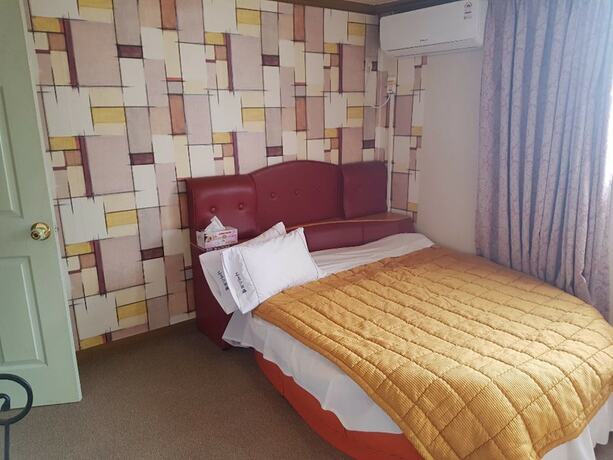 Imagen de la habitación del Hotel Nice Motel. Foto 20