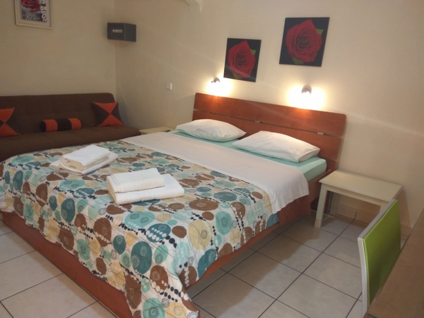 Imagen de la habitación del Hotel Nicolas Studios and Apartments. Foto 11