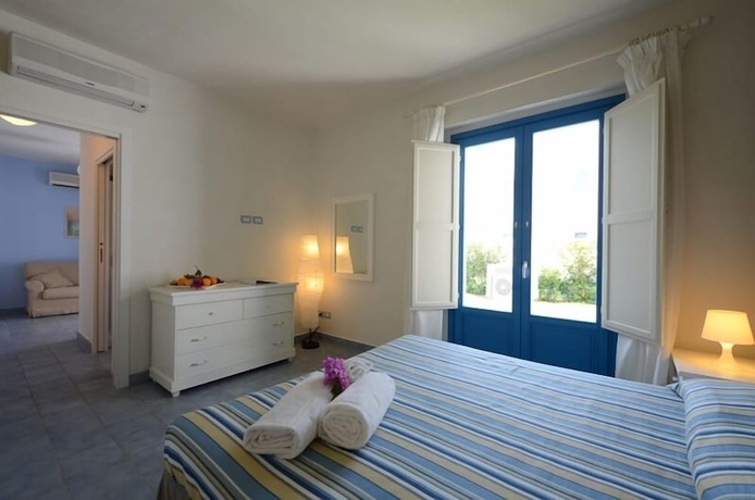 Imagen de la habitación del Hotel Nicolaus Club Borgo Rio Favara Resort. Foto 12