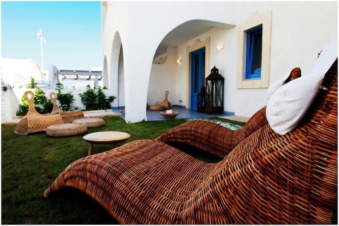 Imagen de los exteriores del Hotel Nicolaus Club Borgo Rio Favara Resort. Foto 17