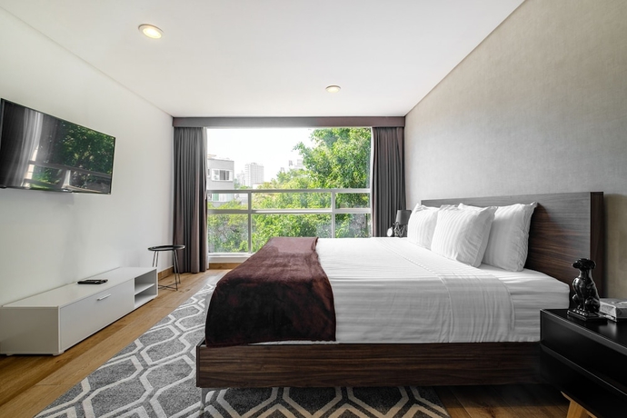 Imagen de la habitación del Hotel Nido Parque Lincoln. Foto 16