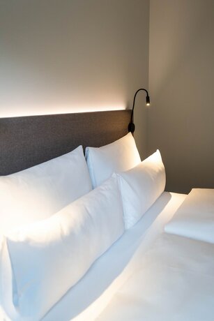 Imagen de la habitación del Hotel Night Inn Bahnhofcity Feldkirch. Foto 17