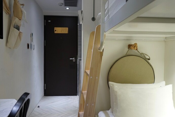 Imagen de la habitación del Hotel Nihao Caf&eacute;. Foto 15