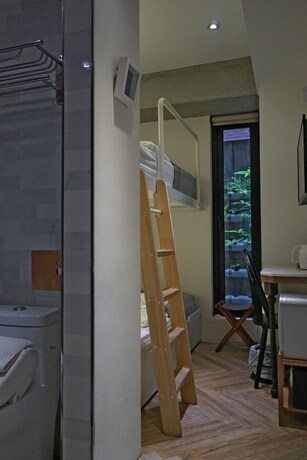 Imagen de la habitación del Hotel Nihao Caf&eacute;. Foto 16