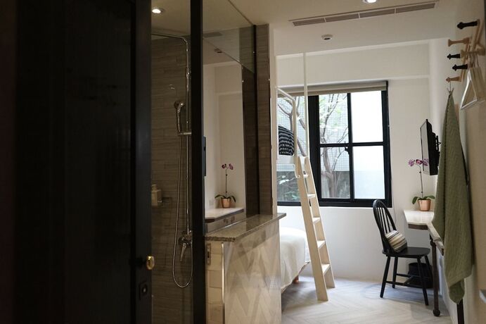 Imagen de la habitación del Hotel Nihao Caf&eacute;. Foto 17