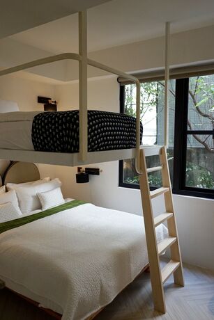Imagen de la habitación del Hotel Nihao Caf&eacute;. Foto 30