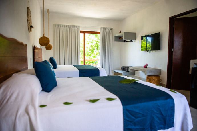 Imagen de la habitación del Hotel Niik Tulum. Foto 3