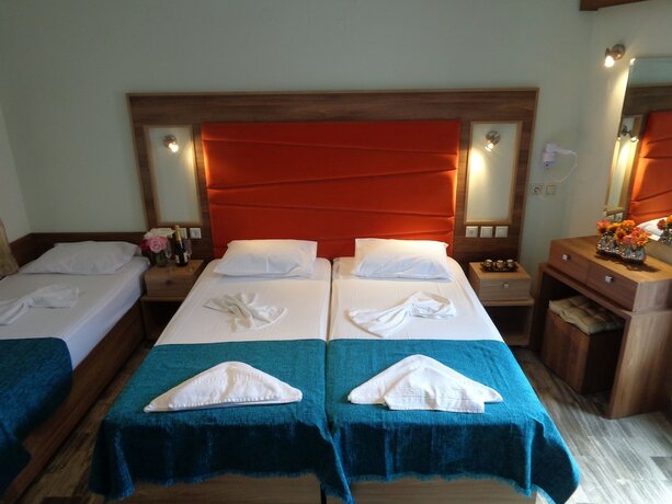 Imagen de la habitación del Hotel Niki Studios Sea-Front. Foto 18