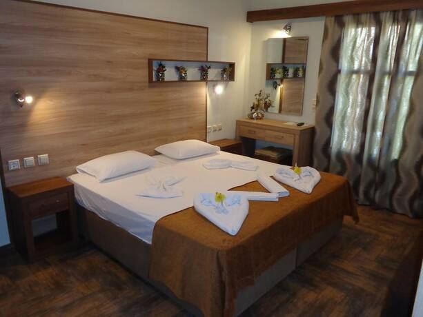 Imagen de la habitación del Hotel Niki Studios Sea-Front. Foto 19