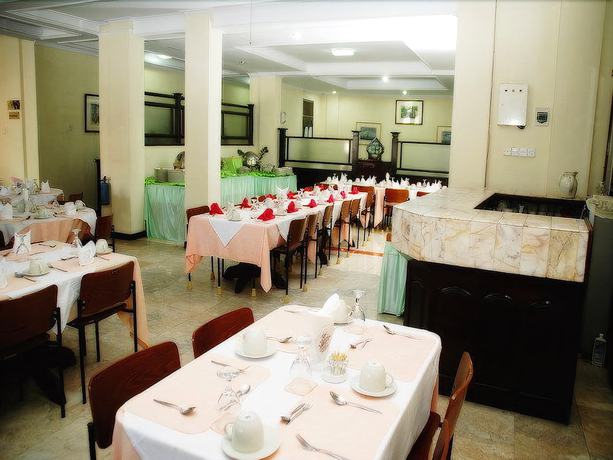 Imagen del bar/restaurante del Hotel Nikita Hotel, Bukittinggi. Foto 2