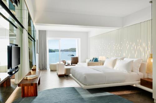Imagen de la habitación del Hotel Nikki Beach Resort and Spa Porto Heli. Foto 15