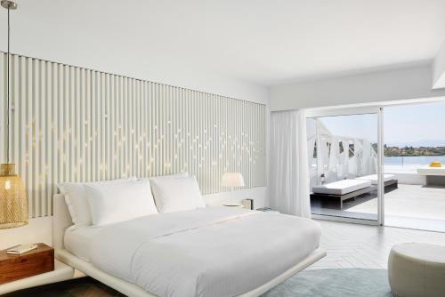 Imagen de la habitación del Hotel Nikki Beach Resort and Spa Porto Heli. Foto 16