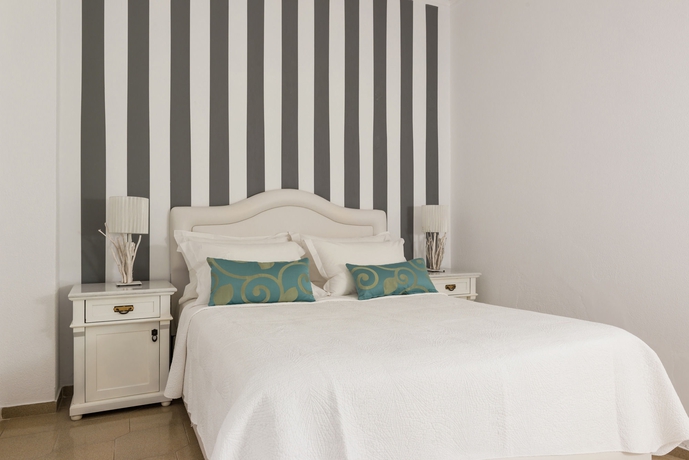 Imagen de la habitación del Hotel Nikki Beach Resort and Spa Santorini. Foto 13