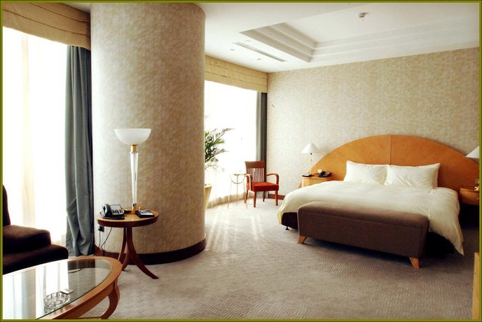 Imagen de la habitación del Hotel Nikko Dalian. Foto 5