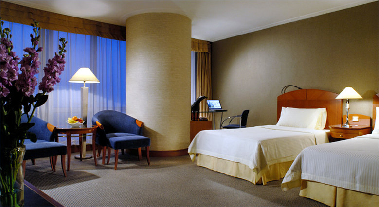 Imagen de la habitación del Hotel Nikko Dalian. Foto 6