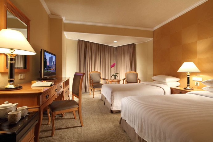 Imagen de la habitación del Hotel Nikko New Century Beijing. Foto 8