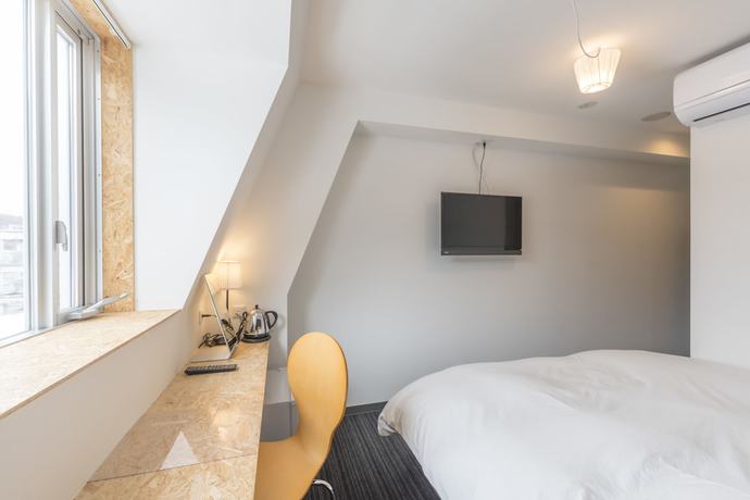 Imagen de la habitación del Hotel Nikko Station Ii Bankan. Foto 11