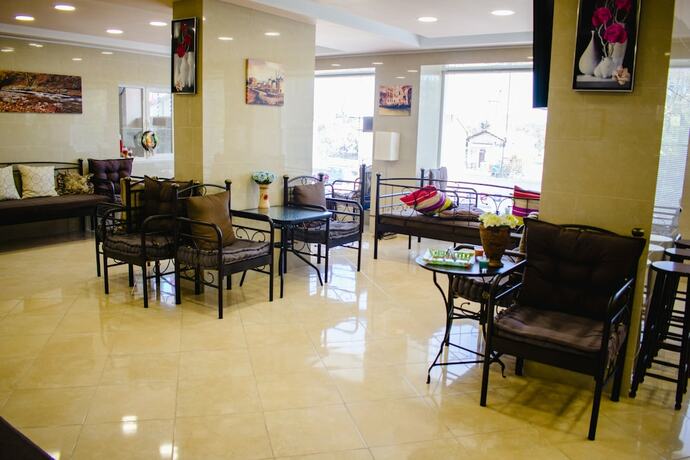 Imagen del bar/restaurante del Hotel Nikolakakis Rooms Lavrio. Foto 10