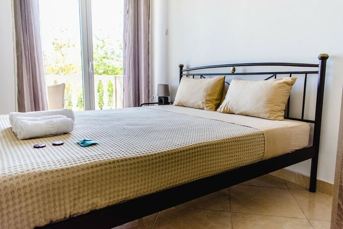 Imagen de la habitación del Hotel Nikolakakis Rooms Lavrio. Foto 16