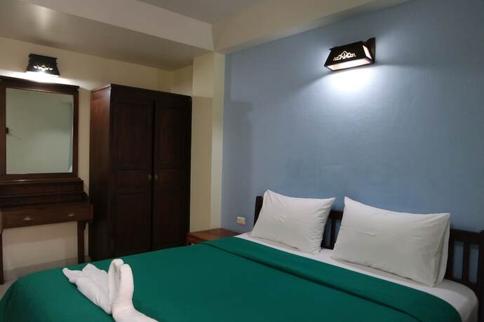 Imagen de la habitación del Hotel Nikom Court. Foto 16