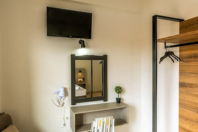 Imagen de la habitación del Hotel Nikos Villas. Foto 16