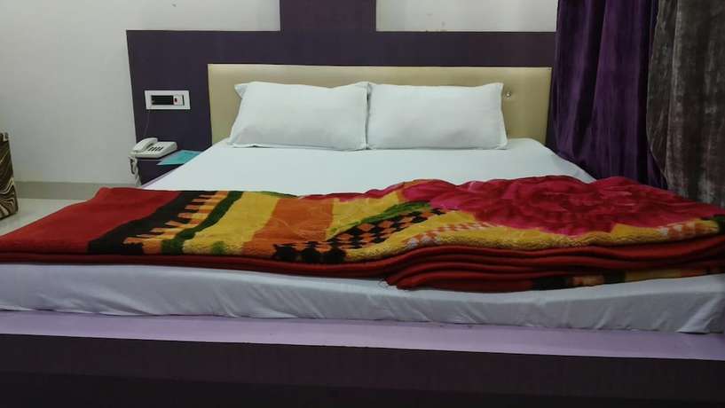 Imagen de la habitación del Hotel Nikunj. Foto 10
