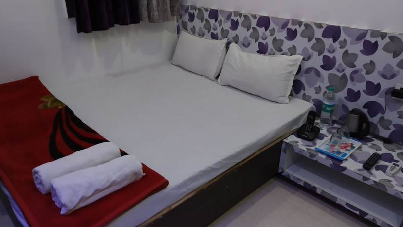Imagen de la habitación del Hotel Nikunj. Foto 12